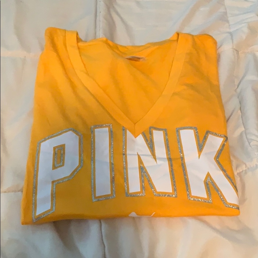 Small yellow vneck pink shirt
